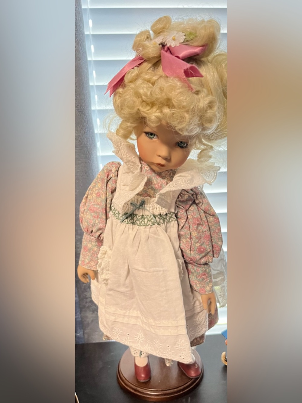 Vintage-Style Blonde Porcelain Doll in Pink Floral Dress and comes with a stand